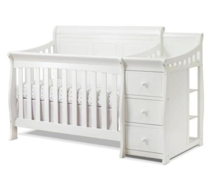 Wooden crib with changing table